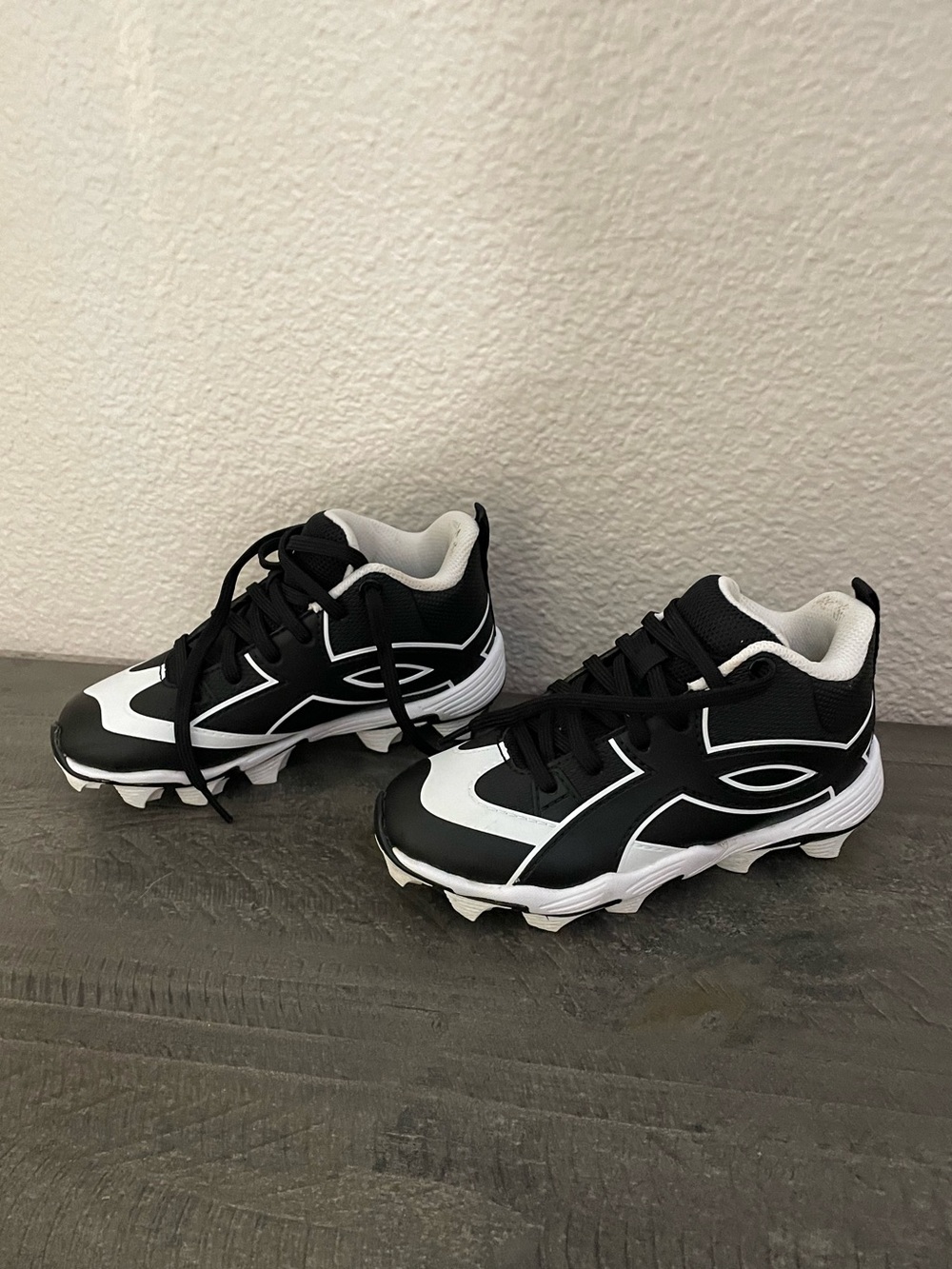 Kids Black and White Athletic Cleats